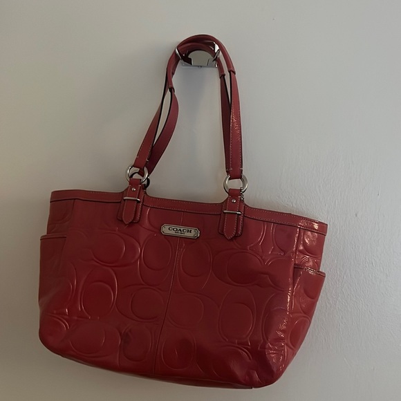 This is a authentic pink coach bag that does have the serial numbers on it